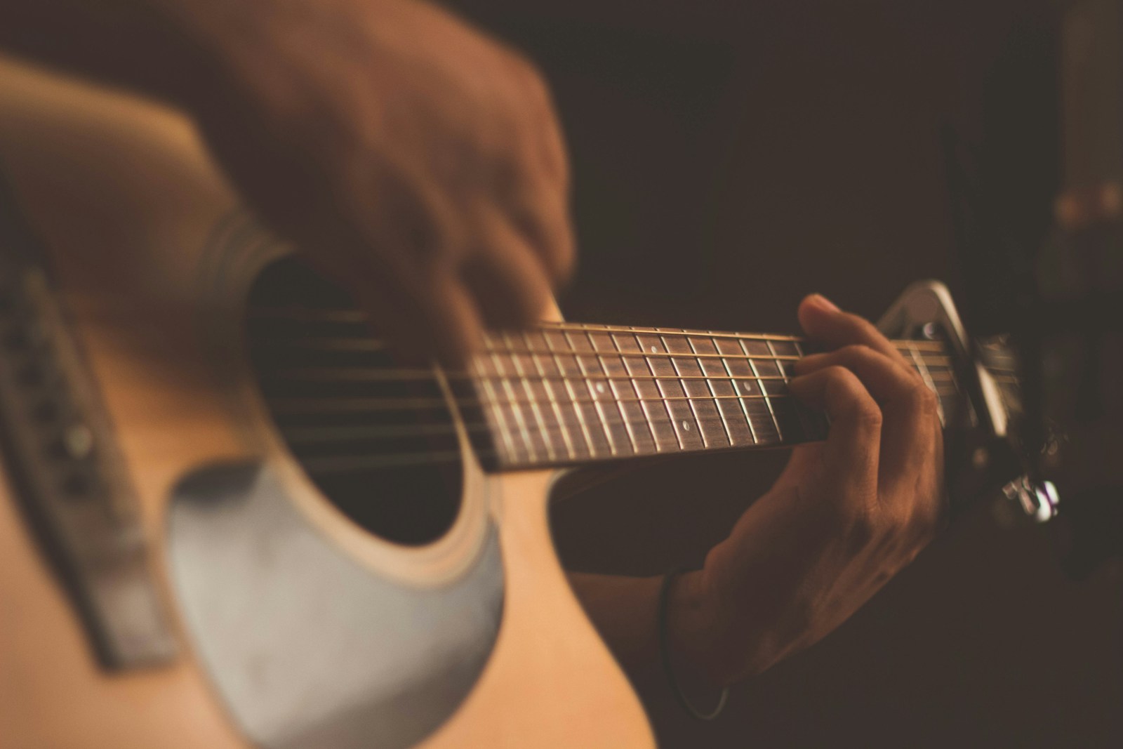 Electric guitar resting in a dimly lit room