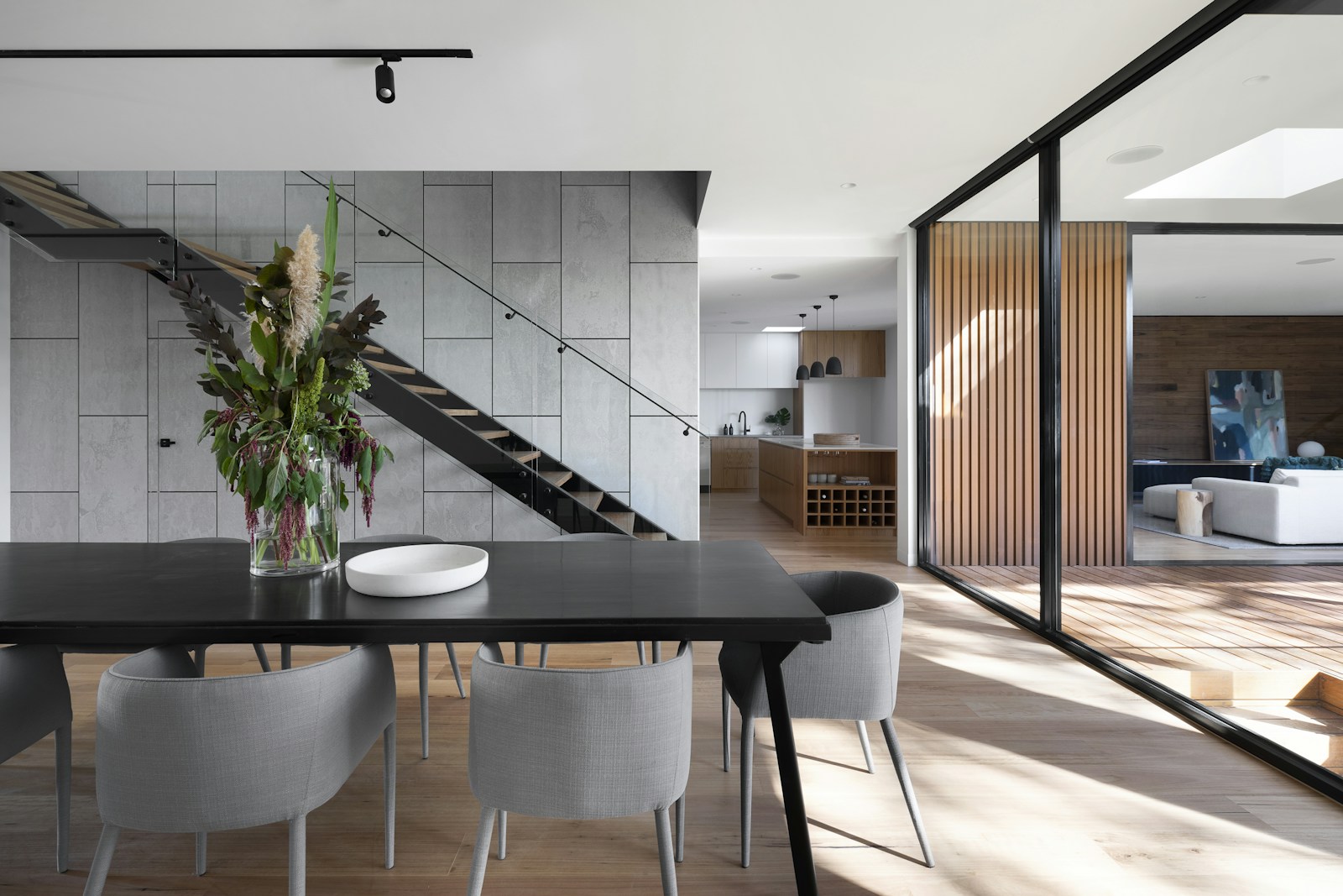 Dark, storybook-style mansion interior with warm light and elaborate architectural details