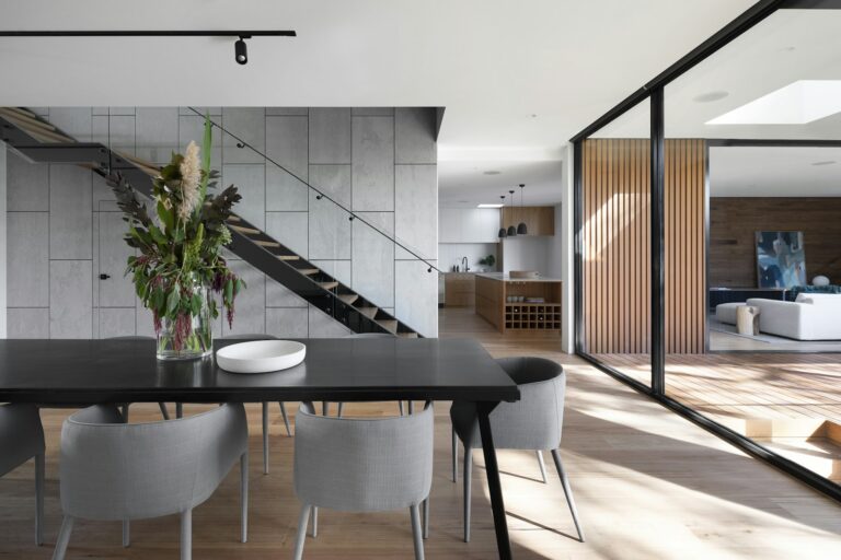 A modern luxury home interior with warm natural light